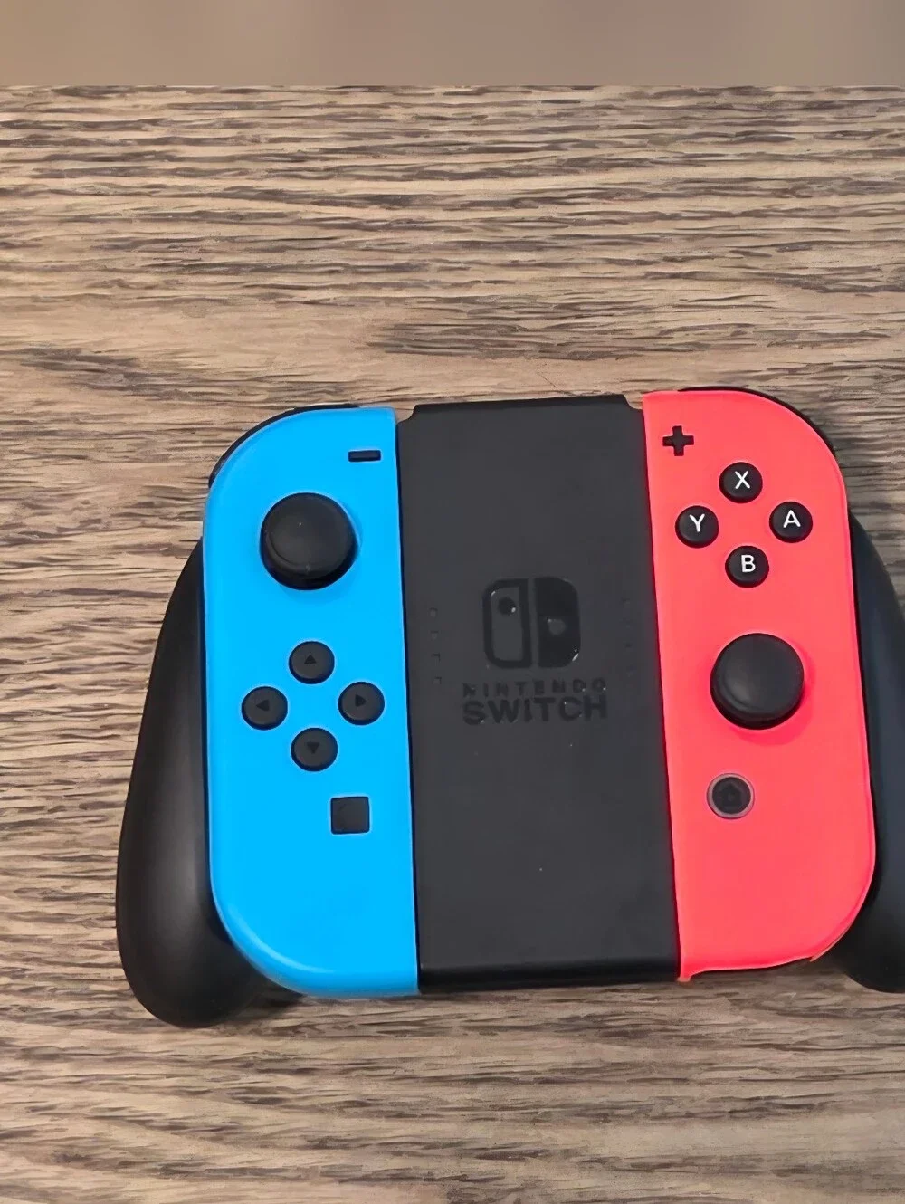 Nintendo Switch OLED - Neon Blue/Neon Red Renewed